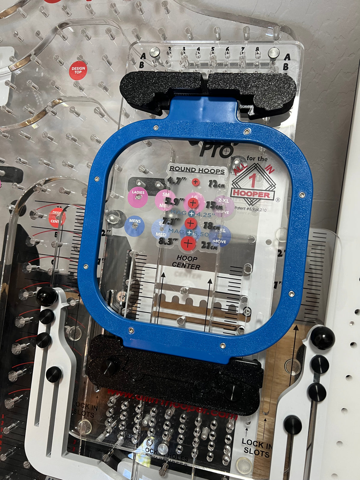 Leveler Pro magnetic hoop sticker overlay on Leveler Pro board
